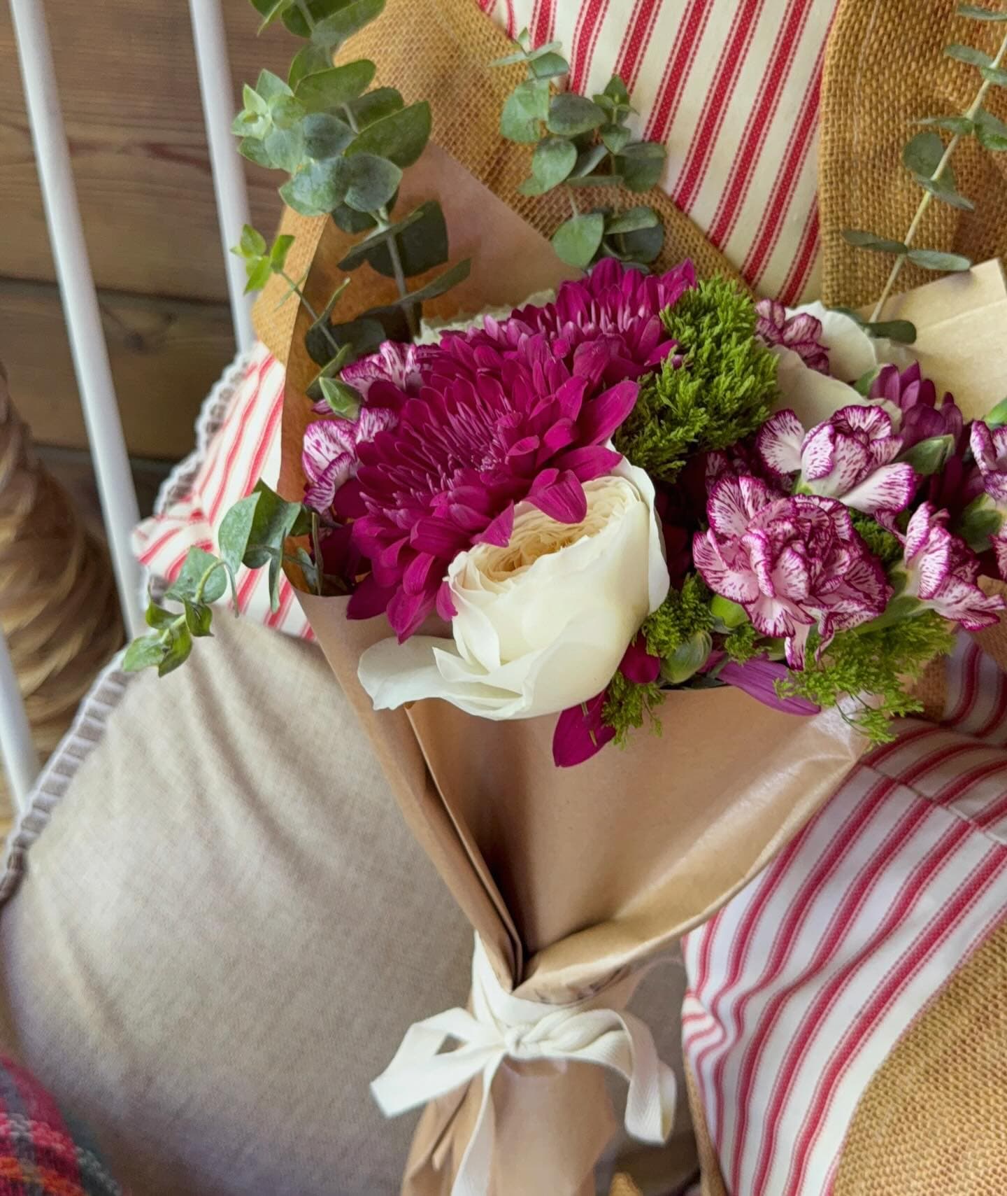 A hand-tied bouquet in progress